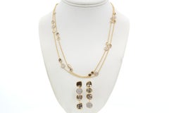 Set aus Halskette und Ohrringen aus 18-karätigem Gelbgold mit organisch geformten Diamantscheiben und Pavé-Diamanten