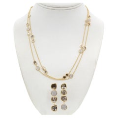 Set aus Halskette und Ohrringen aus 18-karätigem Gelbgold mit organisch geformten Diamantscheiben und Pavé-Diamanten