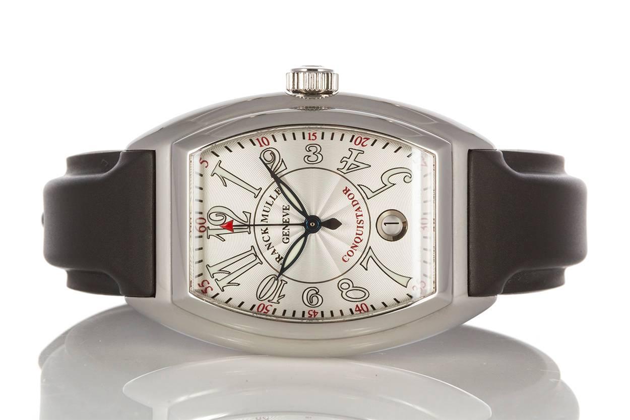 Franck Muller Stainless Conquistador 8005 SC Unisex Automatic Watch With Box & Papers. This watch features a silvered guilloche dial with luminous arabic markers and a black rubber strap. It measures 35mm x 49mm and will fit a wrist up to