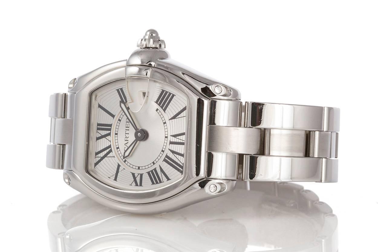 Authentic Ladies Cartier Stainless Steel Roadster W62016V3. This is truly a timeless watch design. The watch comes with the original box and papers as well as the original stainless steel bracelet and 3 additional Cartier straps and a Cartier