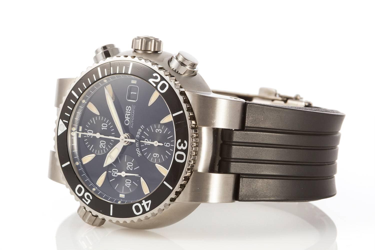 Seltene Oris Titanium Chronograph TT1 Diver 300m Automatikuhr 7542. Sie verfügt über ein Titangehäuse, ein Automatikwerk mit Chronograph und einen Sichtboden. Das Gehäuse misst 44 mm. Sie passt bis zu einem Handgelenk von 7,5