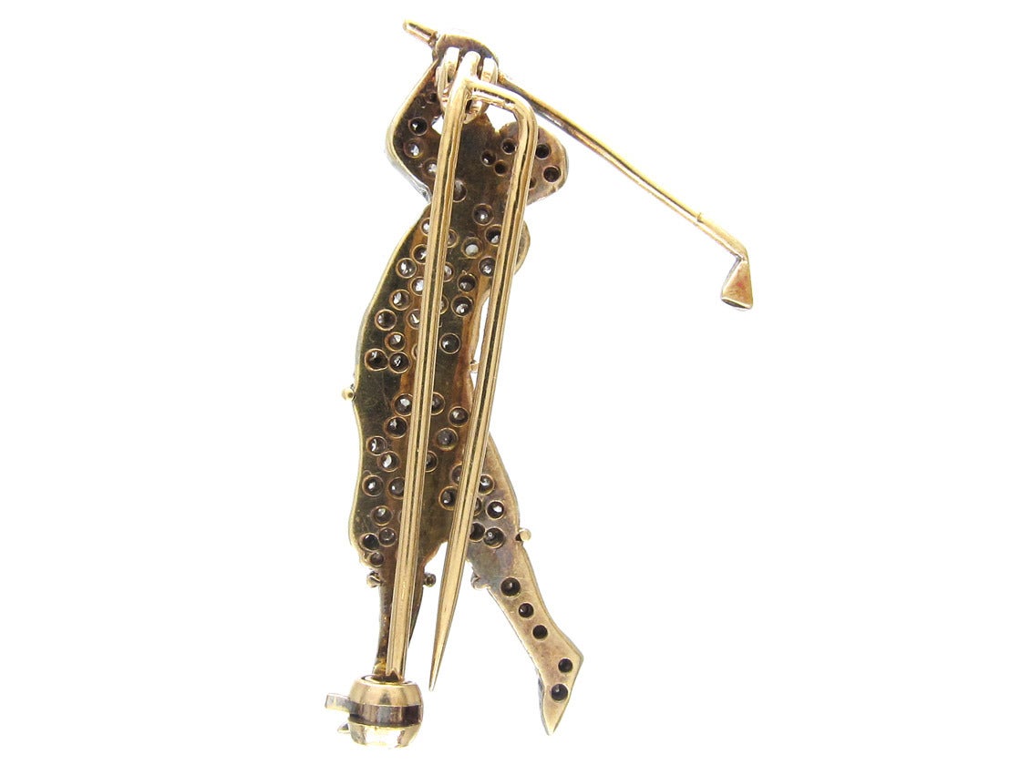 A well made brooch of a golfer which has been studded with good white diamonds. It would make a wonderful present to a golfing enthusiast. It is two colour white and yellow gold and was made circa 1970-1980.