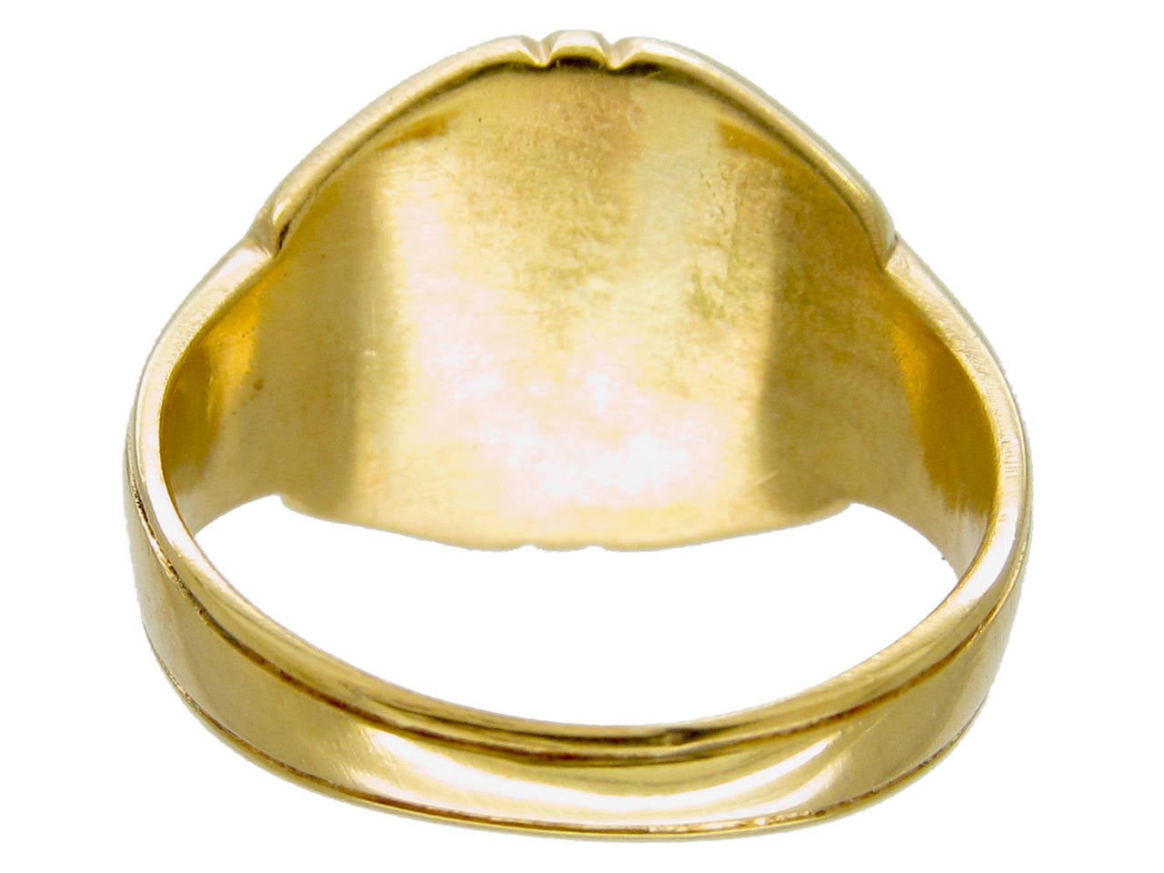 A wonderful rare 18ct gold signet ring which is Victorian, circa 1870. The motto is charming “Love Serves”, with a bull in the centre.