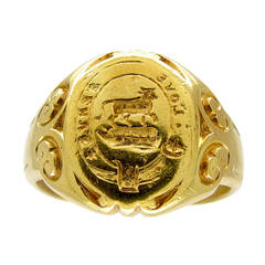 Gold Signet Ring with the Motto "Love Serves"