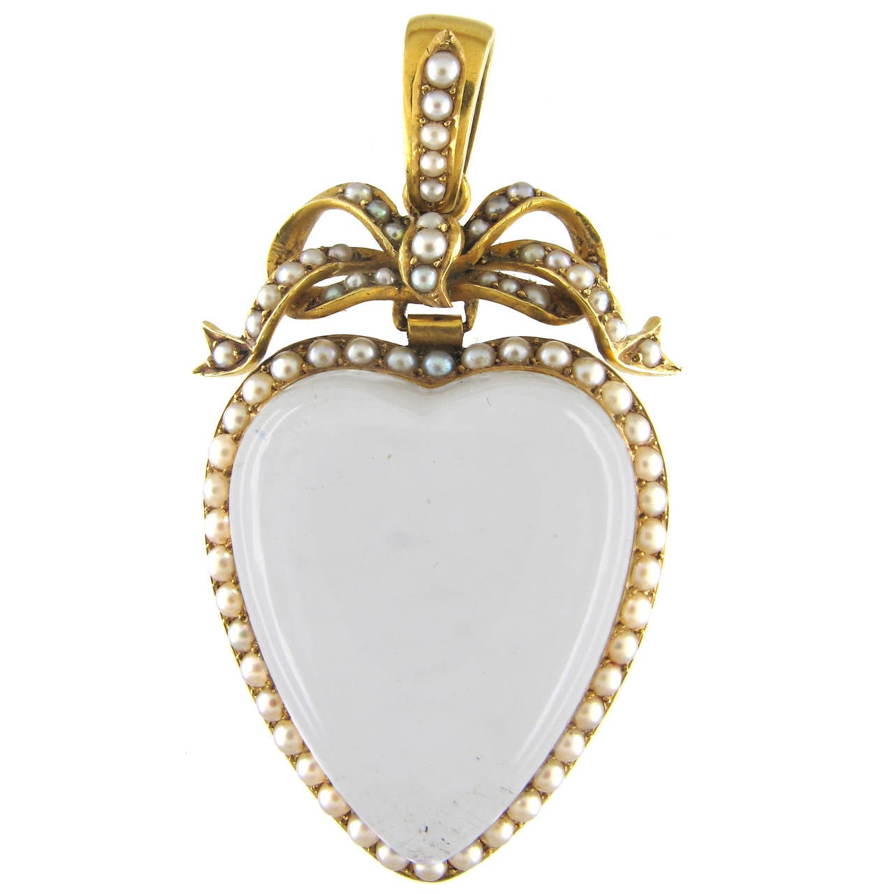 Victorian Large Heart Shaped Rock Crystal Gold Bow Top Pendant For Sale