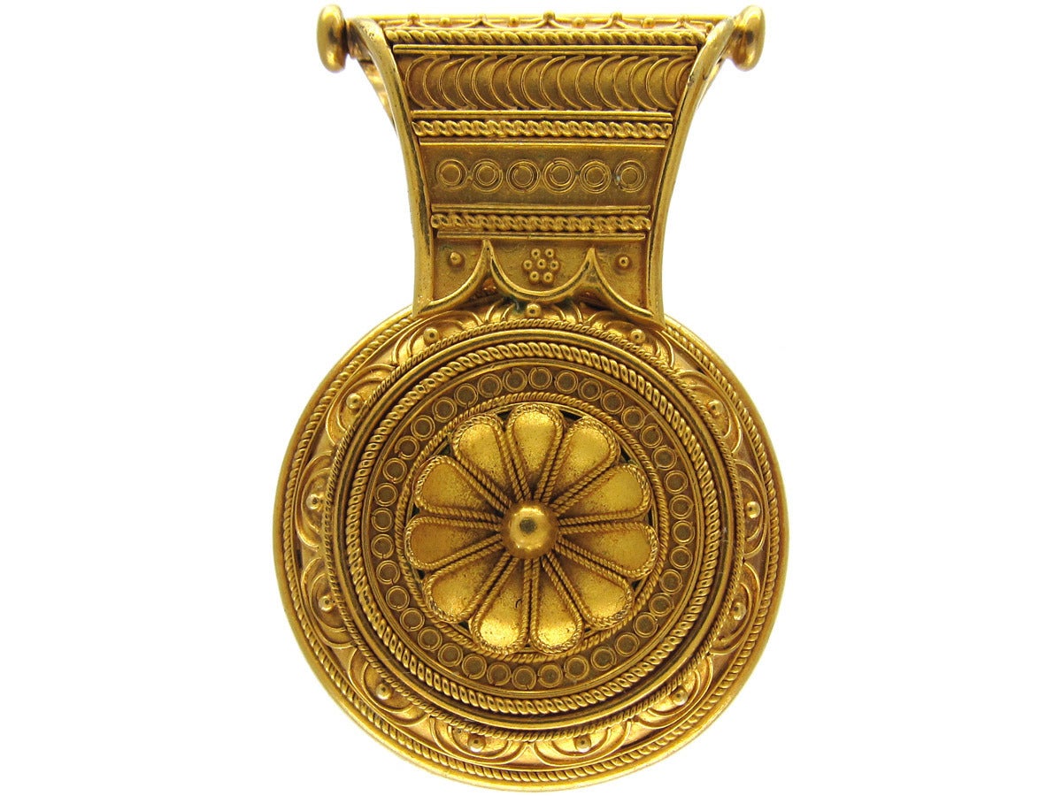 An 18ct gold micromosaic pendant, made in Italy (most likely Rome). Contains very finely worked micromosaic on the front and intricate Etruscan work on the reverse. The bulla opens on a hinge and can be clipped over a chain. It has a locket section