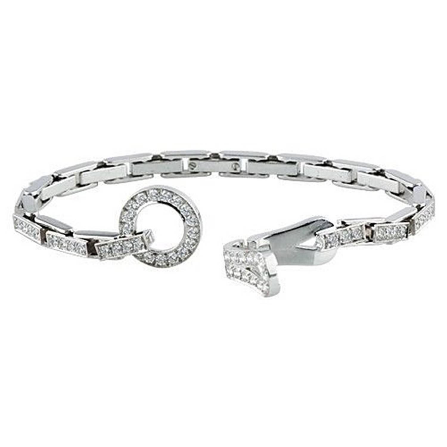 CARTIER AGRAFE BRACELET WITH BRILLIANT CUT DIAMONDS

18K White Gold


Length: 17cm


Diamond weight: 0.85 ct


Cartier has borrowed the central motif of this jewellery collection from the world of Haute Couture.


Inspired by the clasps of the