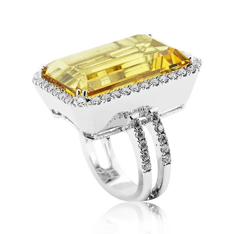 CITRINE AND DIAMOND RING

18Kt white gold


Gemstone: yellowish orange citrine


Total gemstone weight :19 Ct.


Total diamond weight : 1.04 Ct.


Total ring weight : 17.6 Grams