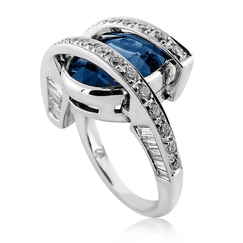 WHITE GOLD RING WITH OVAL CUT SAPPHIRE AND BRILLIANT/BAGUETTE CUT DIAMONDS

18K White Gold


Total diamond weight: 0.55 ct
Clarity: VS-SI
Color: G-H 


Total sapphire weight: 7.24 ct


Total ring weight: 11.30 grams