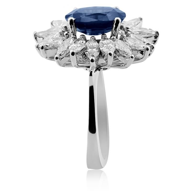 Modern White Gold 5.11 ct Sapphire with Marquise Cut Diamonds Ring For Sale