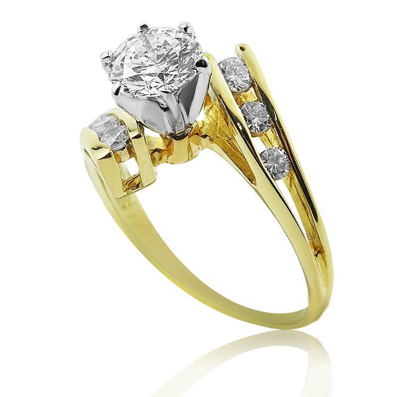 YELLOW GOLD SWEEP RING WITH BRILLIANT CUT DIAMONDS

14K Yellow Gold


Centre stone total diamond weight: 0.76 ct


Clarity: VS1


Color: G


Side stones total weight: 0.20 ct


Clarity: VS2-SI1


Color:G


Total ring weight: 2.98 grams

