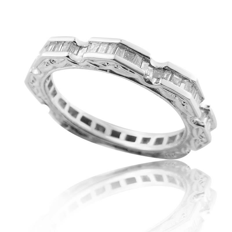 WHITE GOLD WEDDING BAND WITH EMERALD CUT DIAMONDS

18K White gold


Total diamond weight: 0.77 ct


Color: G


Clarity: VS-SI


Total ring weight: 3.80 grams
