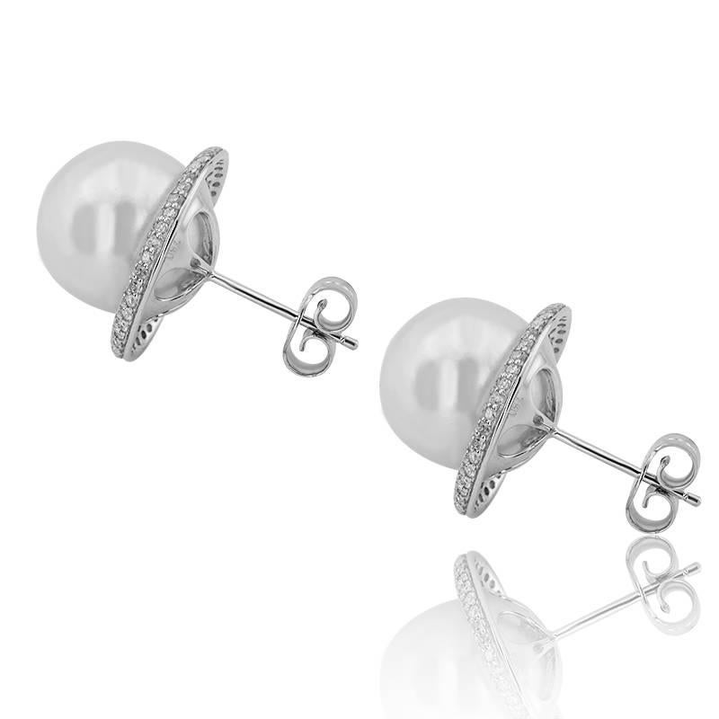 WHITE GOLD SOUTH SEA PEARL EARRINGS WITH BRILLIANT CUT DIAMONDS

18K White Gold


Total diamond carat weight: 0.78 ct
Color: G-H
Clarity: VS-SI 


Pearl Size: 11-12 mm


Total earrings weight: 8.56 grams