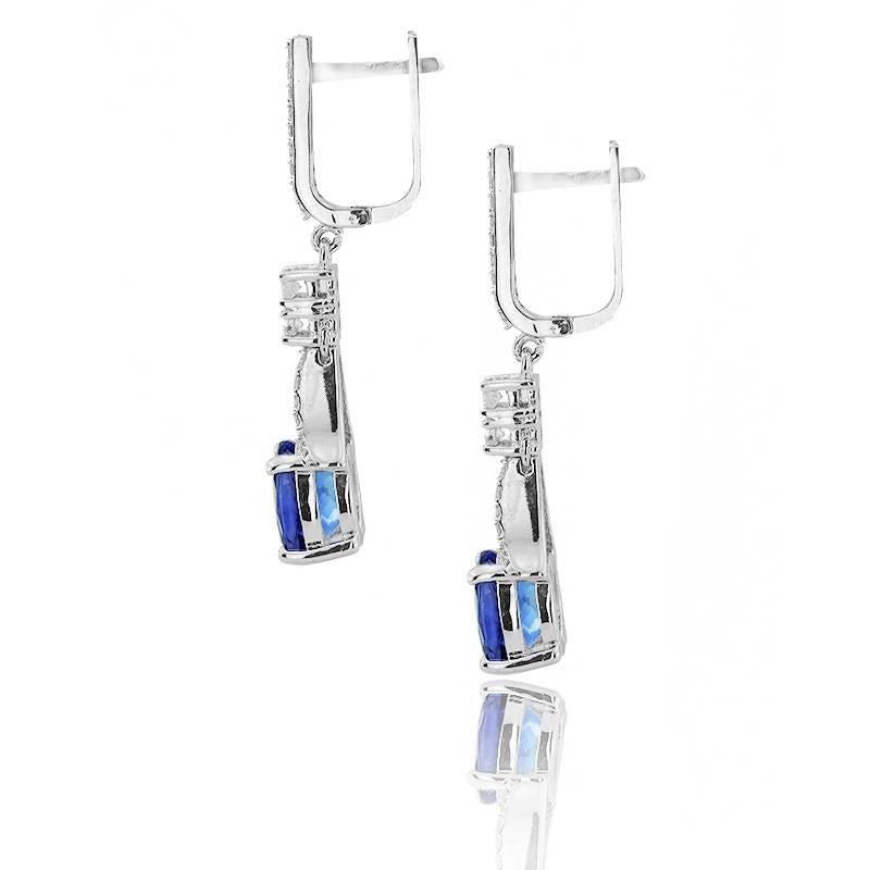 WHITE GOLD EARRINGS WITH OVAL TANZANITE AND BRILLIANT CUT DIAMONDS

18K White Gold


Total diamond weight: 0.43 carat
Color: G-H
Clarity: VS-SI


Total stone weight: 3.67 carat


Total earrings weight: 12.01 grams