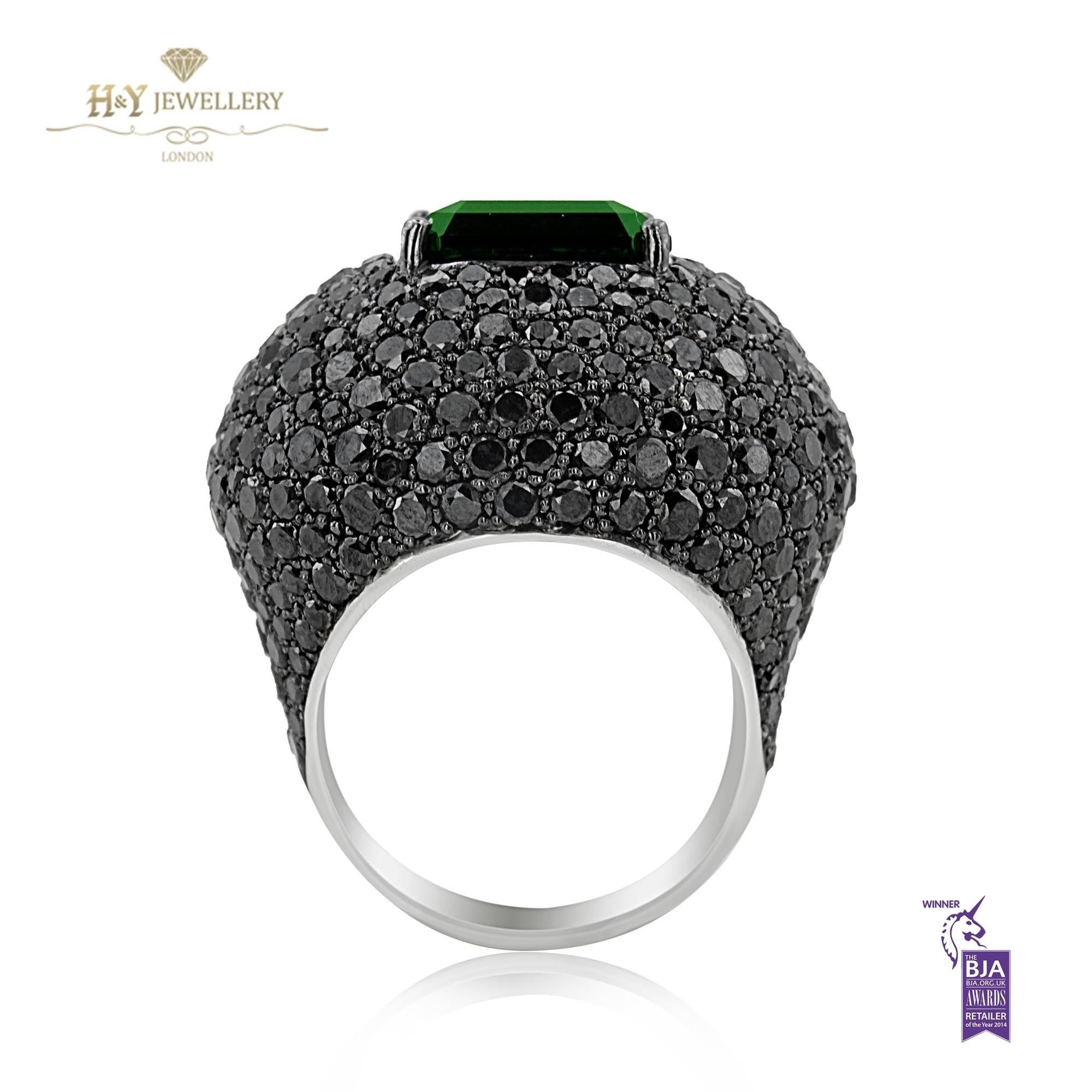 WHITE GOLD BLACK DIAMONDS AND GREEN TOURMALINE RING - 10.70 CT

Set in 18K White gold


Total crome tourmaline weight: 6.00 ct


Total black diamond weight: 4.70 ct


Total ring weight: 18.54 grams