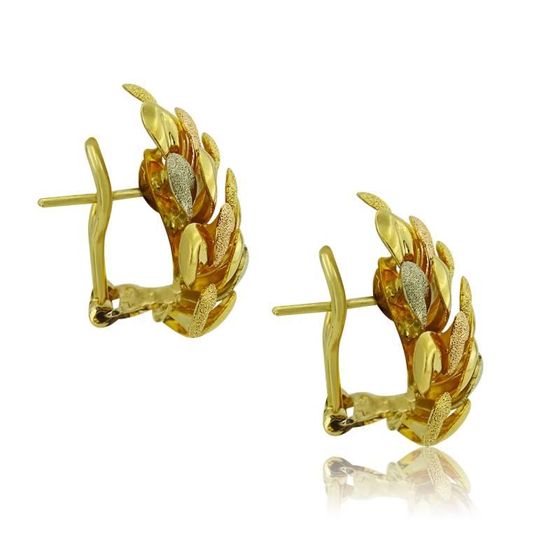 THREE COLOURS OF GOLD AUTUMN EARRINGS

Weight: 15 gr