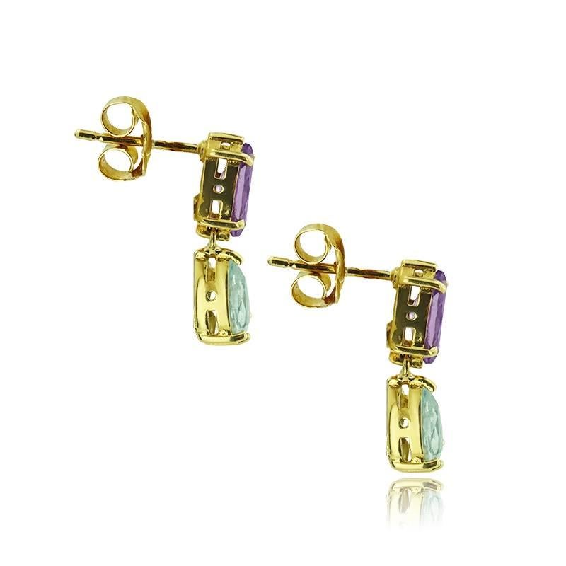 YELLOW GOLD PETIT EARRINGS WITH MARQUISE CUT AMETHYST AND PEAR CUT BLUE TOPAZ

Weight: 3.60 gr