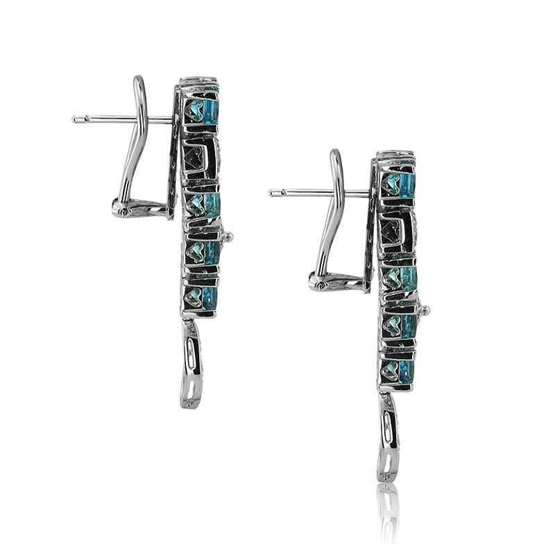 WHITE GOLD DROP EARRINGS WITH PRINCESS CUT BLUE TOPAZ AND BRILLIANT CUT DIAMONDS

Princess Cut Blue Topaz Carat: 6.77


Brilliant Cut Diamonds Carat: 0.57
Color: F-H
Clarity: VS


Weight: 18.41 gr