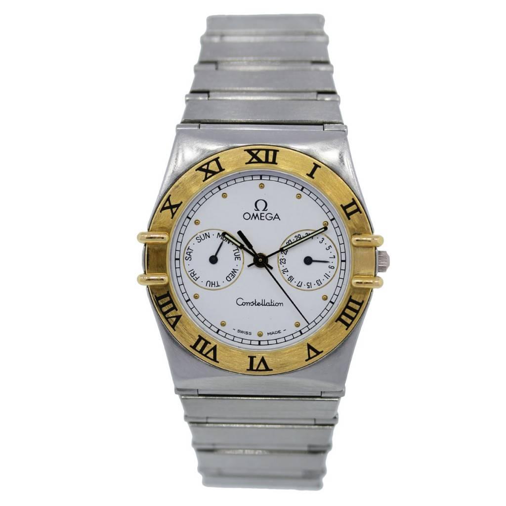 Brand: Omega
Model: Constellation
Case Material: Stainless Steel
Case Diameter: 34mm (with crown)
Crystal: Scratch resistant sapphire
Bezel: Fixed 18K Yellow Gold Bezel
Dial: White Chronograph Dial with 2 sub dials for day and date. Gold sticks and