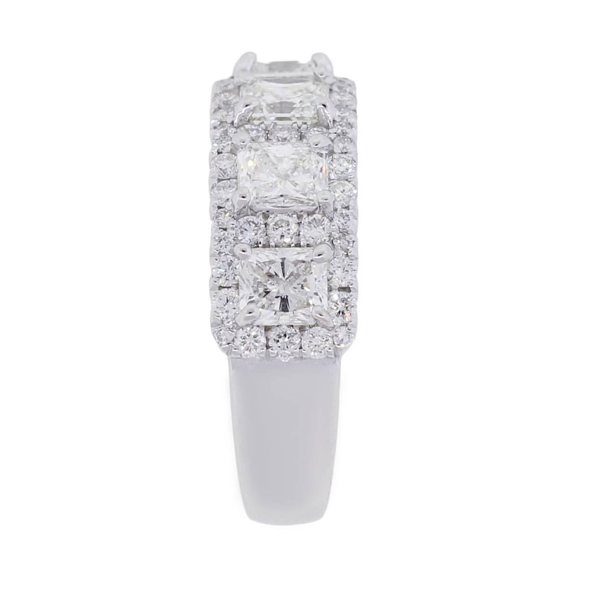Material: 18k white gold
Diamond Details: Approximately 2.24ctw of round brilliant and radiant shape diamonds. Diamonds are F/G in color and VS in clarity
Ring Size: 6 (can be sized)
Ring Measurements: 0.87″ x 0.27″ x 0.87″
Total Weight: 6g