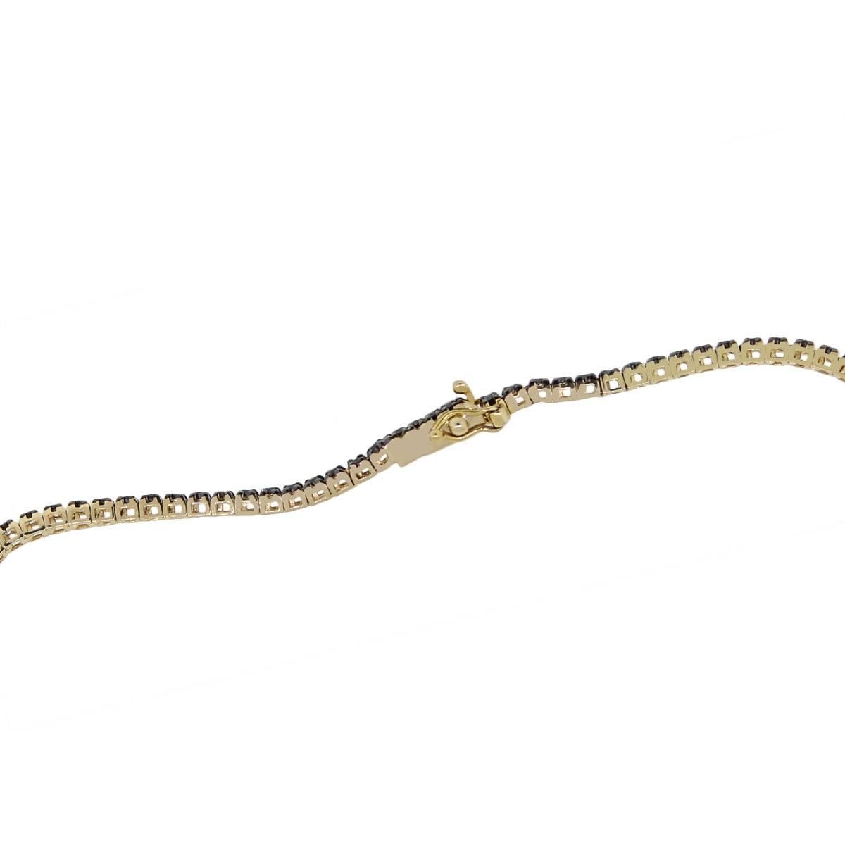 Material: 14k yellow gold
Diamond Details: Approximately 0.55ctw black treated diamonds.
Clasp: Tongue in box Clasp
Total Weight: 4.6g (3.0dwt)
Measurements: will fit up to a 7″ wrist
Additional Details: This item come with a presentation Box!
SKU: