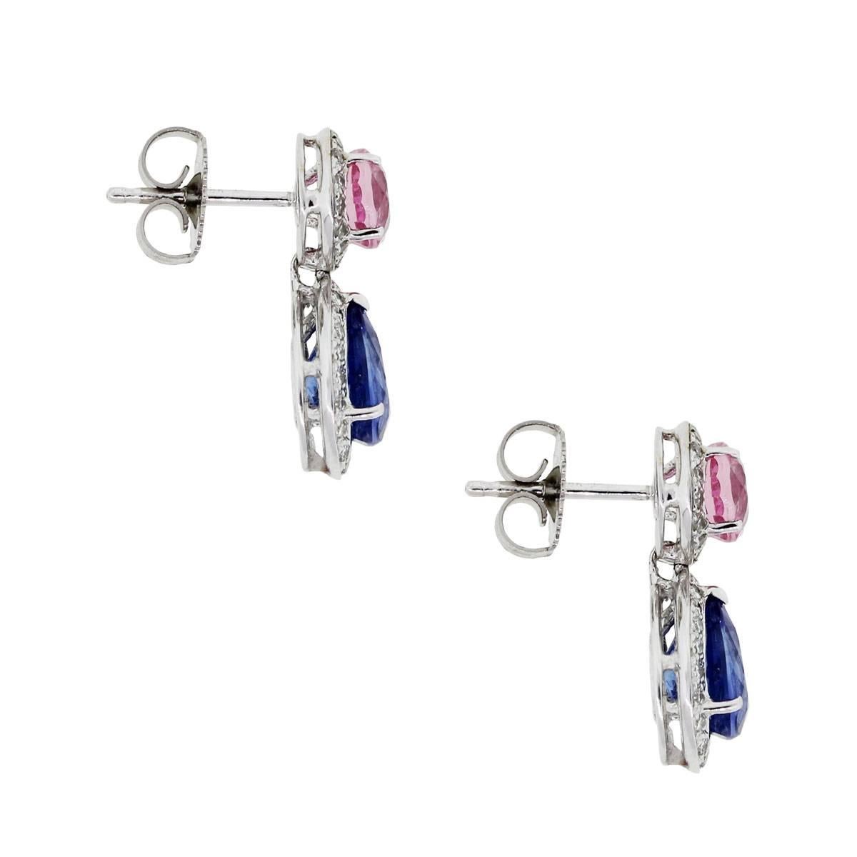 Material: 18k white gold
Diamond Details: Approximately 0.38ctw of round brilliant diamonds. Diamonds are H/I in color and SI in clarity
Gemstone Details: Round shape 2.24ctw pink sapphires and 3.32ctw pear shape blue sapphire
Earring Measurements: