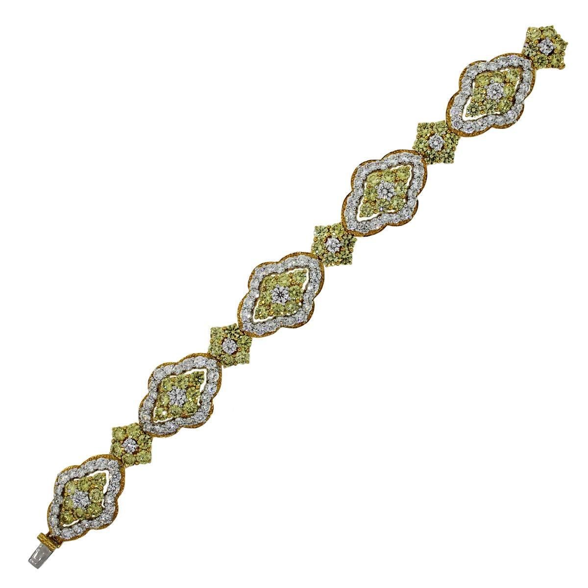 Material: 18k two tone gold
Diamond Details: Approximately 14ctw HPHT treated yellow diamonds and approximately 7.7ctw white round brilliant diamonds. White diamonds are G/H in color and VS in clarity.
Clasp: Tongue in box clasp
Measurements: 7.5″ x