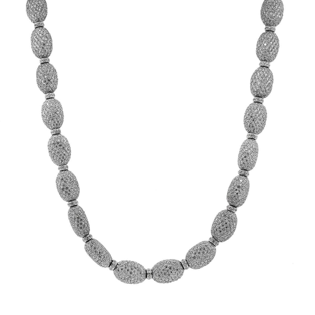 Material: 18k White Gold
Diamond Details: Approximately 36.35ctw of round brilliant diamonds. Diamonds are G/H in color and SI1-I1 in clarity.
Necklace Measurements: 19″
Clasp: Hidden hook clasp
Total Weight: 105.3g (67.7dwt)
SKU: A30311364