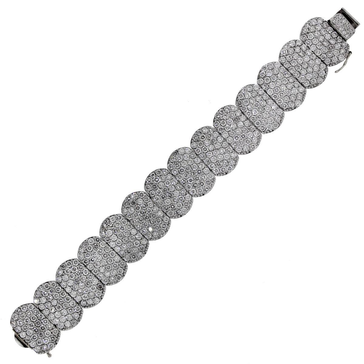 Material: Platinum
Diamond Details: Approximately 33.65ctw round brilliant diamonds. Diamonds are G/H in color and VS in clarity.
Clasp: Tongue in box clasp with safety latch
Measurements: 7″ x 0.19″ x 0.87″
Total Weight: 104.5g (67.3dwt)
Style #: