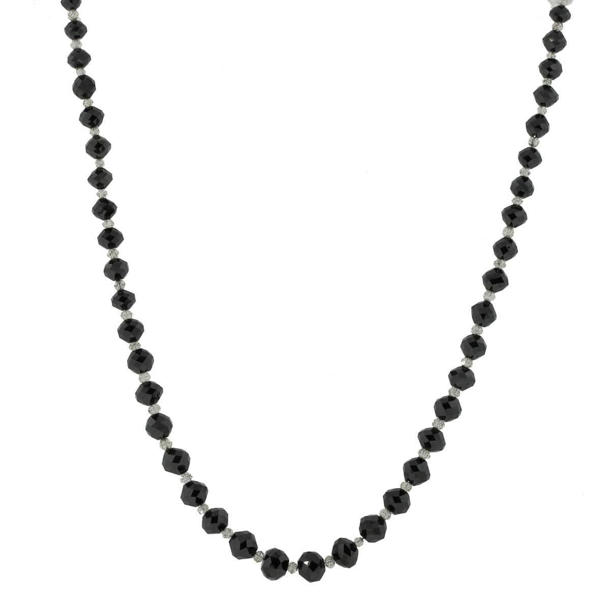 Material: 18k white gold
Diamond Details: Approximately 80ctw of black and white briolette shape diamonds. White diamonds are G/H in color and SI in clarity
Necklace Measurements: 16.50″
Clasp: Tongue in box clasp with safety latch
Total Weight:
