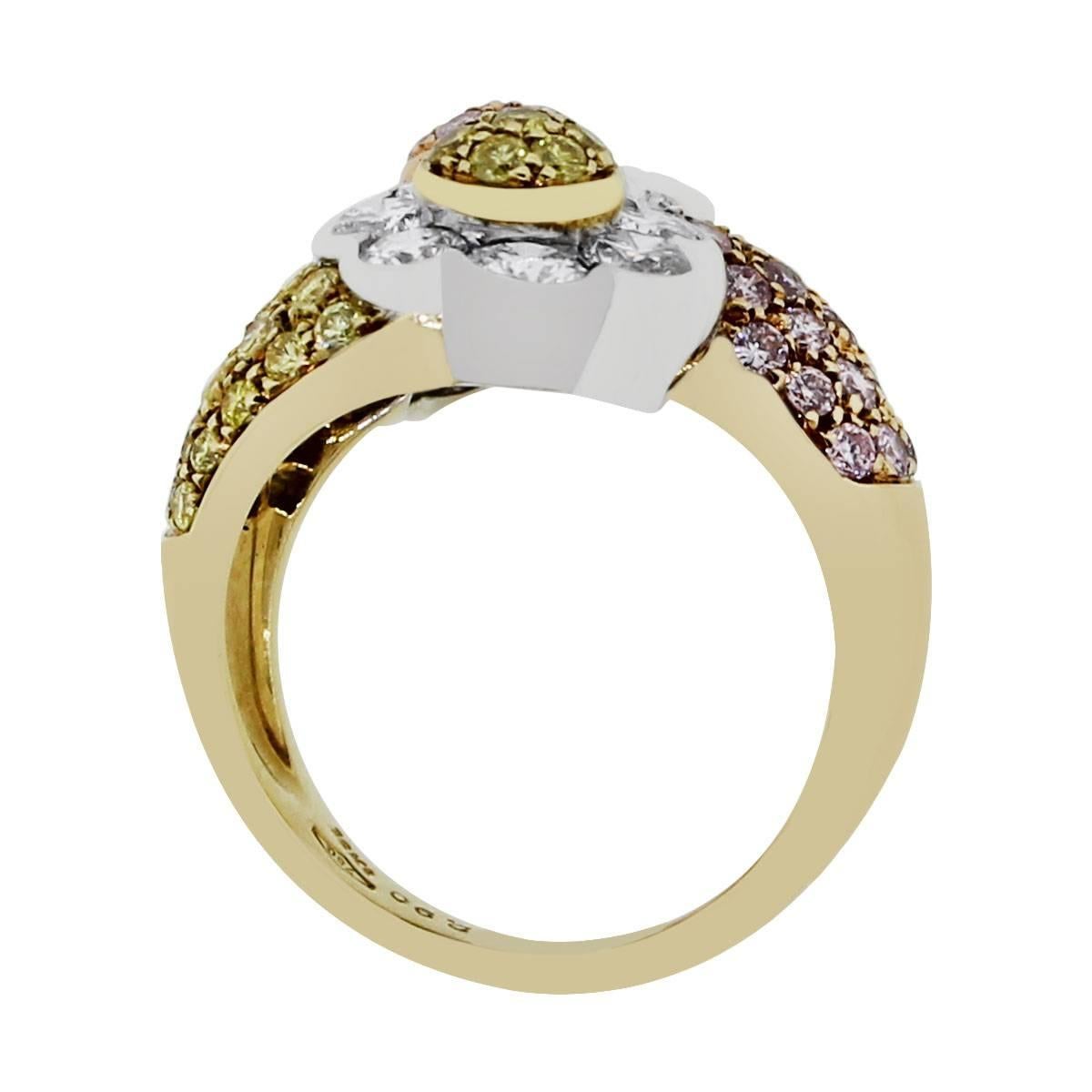 Style: Floral ring
Material: Tri color gold floral ring
Diamond Details: Approximately 2.90ctw pink, yellow and white round brilliant cut non treated diamonds.
Ring Size: 6.5 (can be sized)
Ring Measurements: 0.75″ x 0.70″ x 1″
Total Weight: 11.1g
