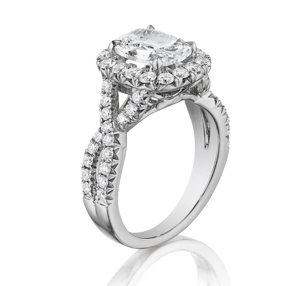 Material: 18k White Gold
Setting Style: Halo
Size: 6.5 (can be sized)
Center Diamond Details: 0.71ct cushion cut diamond. Center diamond is D in color and VVS2 in clarity. GIA Certified
Accent Diamond Details: 0.95ct round brilliant diamonds
SKU: