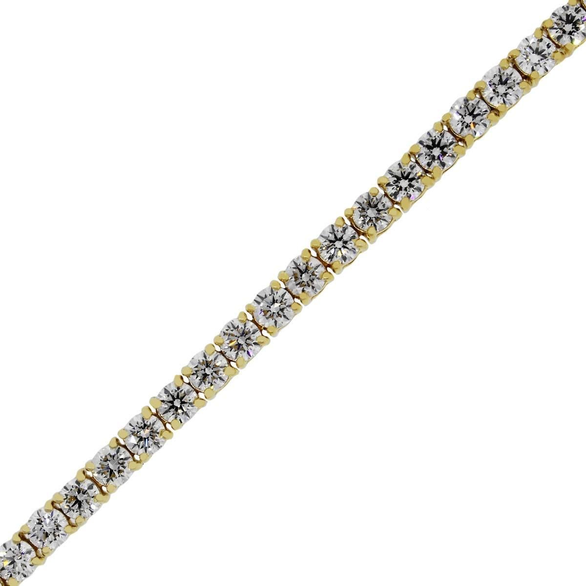 Material: 14k yellow gold
Diamond Details: Approximately 6.36ctw round brilliant diamonds. Diamonds are G/H in color and VS in clarity.
Clasp: Tongue in box clasp with safety latch
Measurements: 7″
Total Weight: 9.4g (6.0dwt)
SKU: A30311460