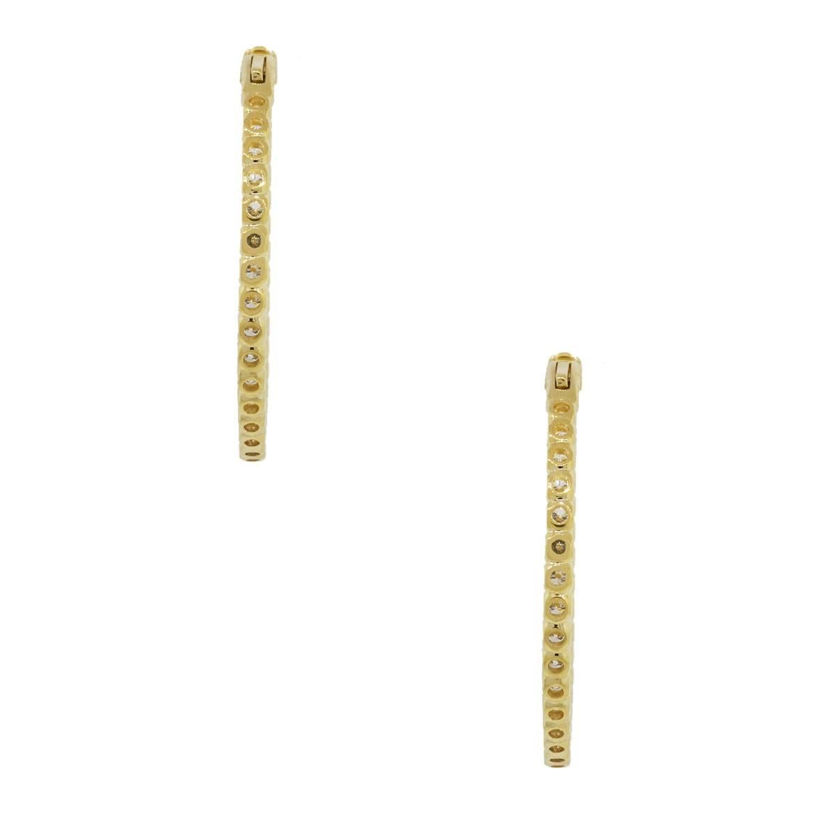 Material: 14k yellow gold
Diamond Details: Approximately 7.15ctw of round brilliant diamonds. Diamonds are G/H in color and VS in clarity.
Measurements: 2″ x 0.20″ x 2″
Clasp: Hinged post back closure
Total Weight: 17.9g (11.5dwt)
SKU: A30311453