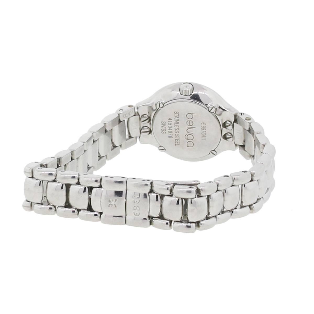 Brand: Ebel
Style: Beluga
MPN: E9976-11
Case Material: Stainless steel
Case Diameter: 27mm
Bezel: Stainless steel
Dial: Mother of pearl diamond dial
Bracelet: Stainless steel
Crystal: Sapphire
Size: Will fit a 6.50″ wrist
Clasp: Fold over hidden