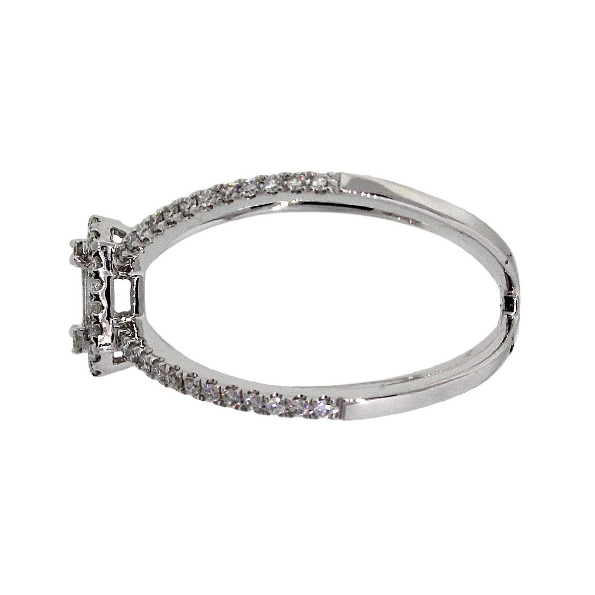 Material: 18k White gold
Diamond Details: Approximately 0.24ctw round brilliant cut diamonds. Diamonds are G/H in color and VS in clarity.
Baguette Diamond Details: Approximately 0.12ctw Baguette cut diamonds. Diamonds are G/H in color and VS in