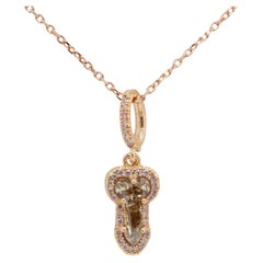 Collana con diamante fallico in oro rosa 14k