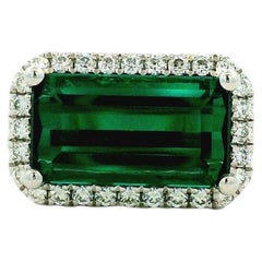14k White Gold 3.54ct Emerald Cut Blue Tourmaline and 0.27ctw Diamond Halo Ring