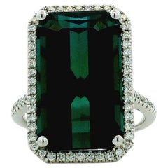 14k White Gold Blue Tourmaline and 0.34ctw Diamond Halo Ring