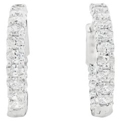 Orecchini a cerchio in oro bianco 14k con pavé di diamanti ovali per un totale di 2,37 carati