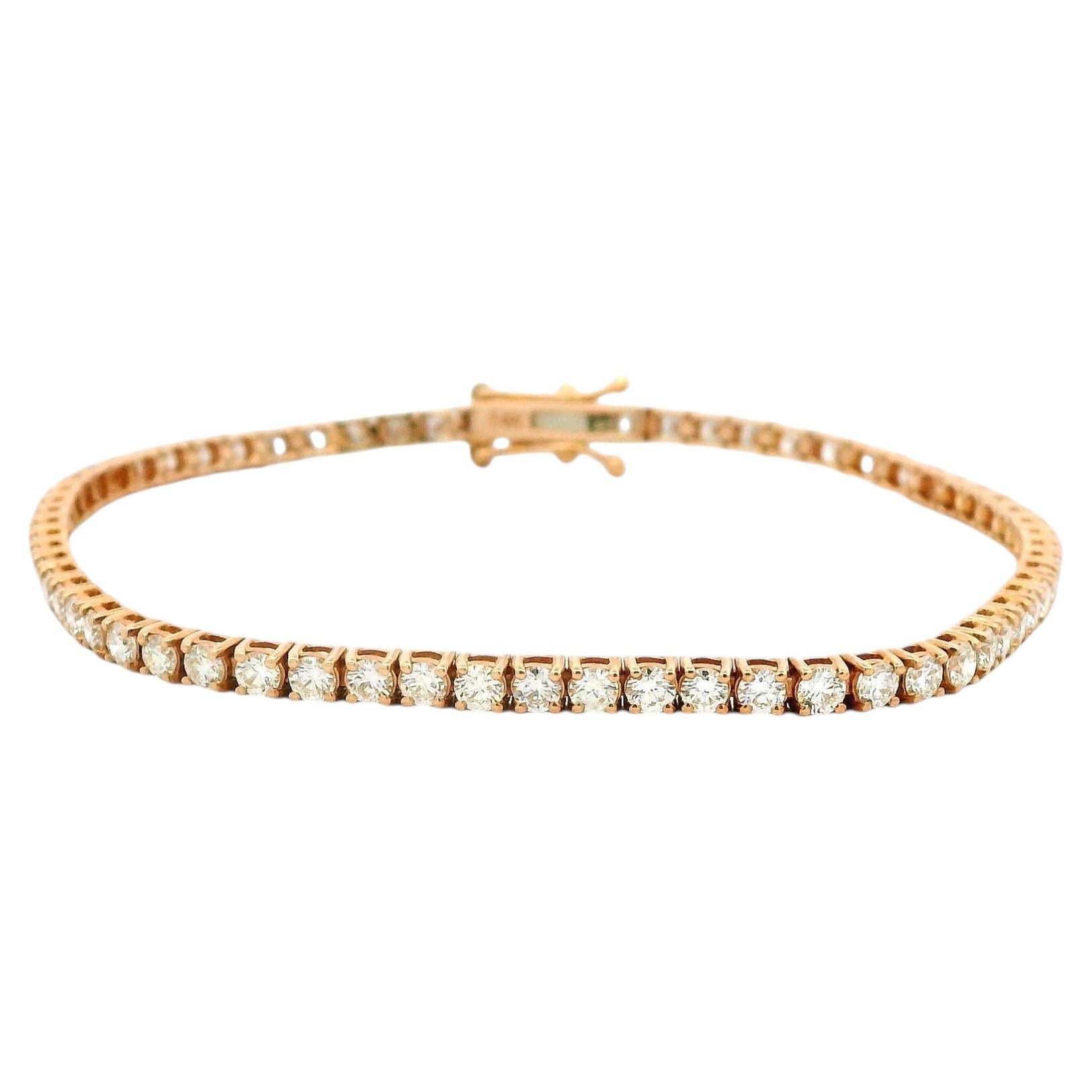 Bracelet « tennis » en or rose 14 carats, serti de diamants ronds taille brillant d'un poids total de 3,32 carats en vente