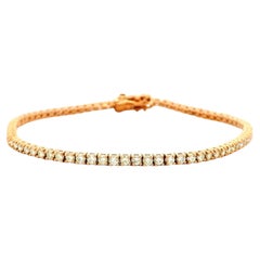 Bracelet « tennis » en or rose 14 carats, serti de diamants ronds taille brillant d'un poids total de 2,40 carats