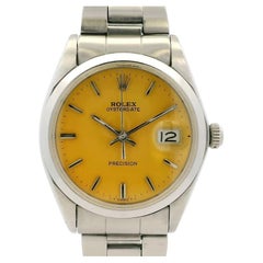 Rolex 6694 Oysterdate – Uhr aus Edelstahl mit gelbem Zifferblatt