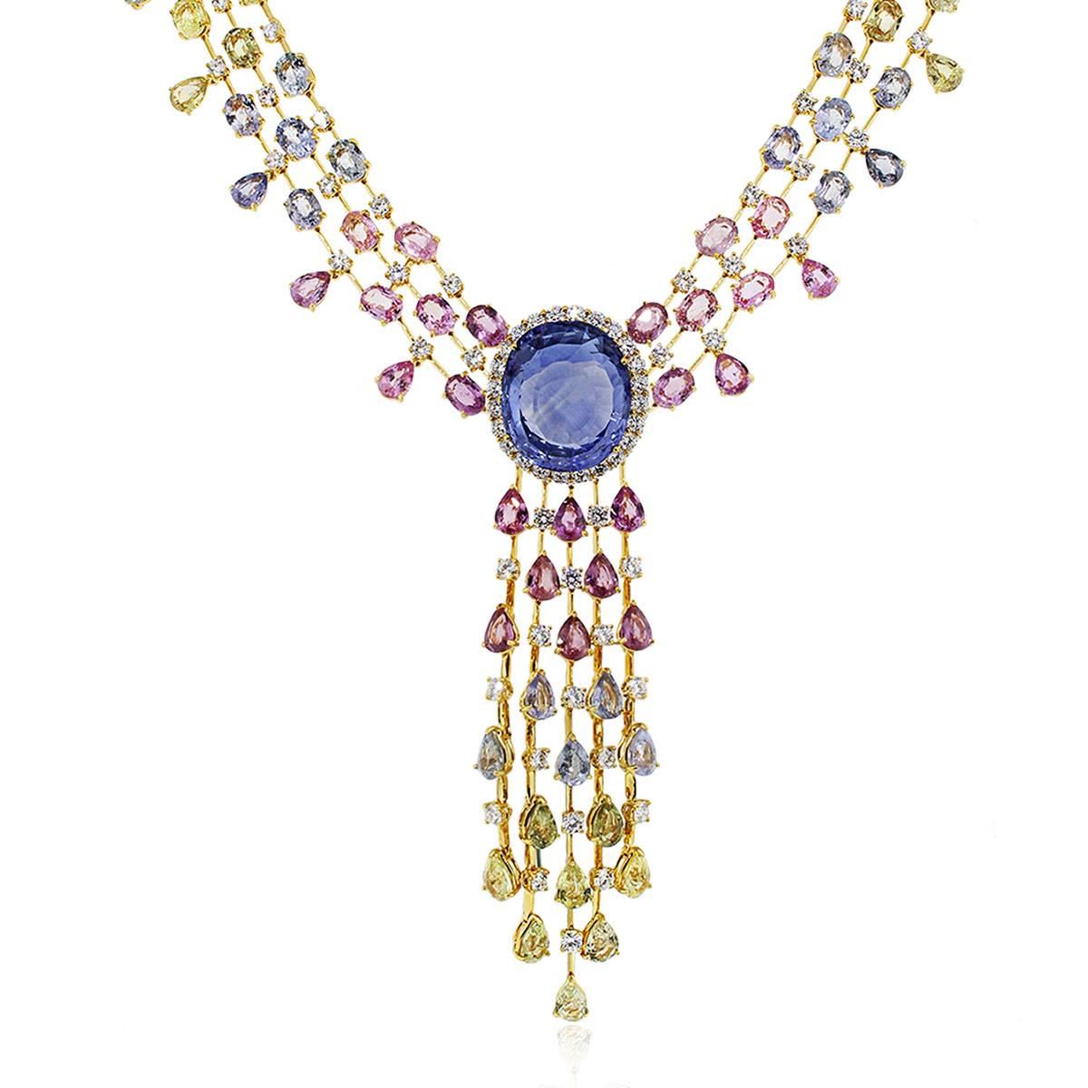 Material: 18k Yellow Gold
Style: Sapphire diamond necklace
Diamond Details: 113 round brilliant cut diamonds approx. 11.72ctw. Diamonds are G/H in color and VS in clarity.
Center Stone Details: Center oval shape sapphire is approx. 48.85ct (No heat