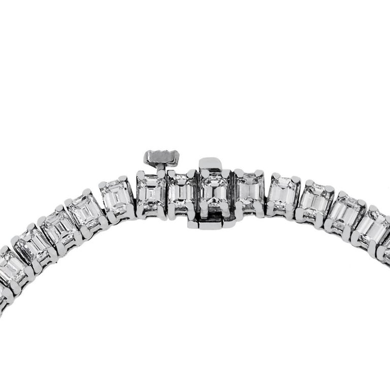 Material: 18k White Gold
Diamond Details: Approximately 31.03ctw emerald cut diamonds. Diamonds are I/J in color and VS in clarity.
Necklace Measurements: 16.5″
Clasp: Tongue in box clasp
Total Weight: 40.0g (25.7dwt)
SKU: A30311686