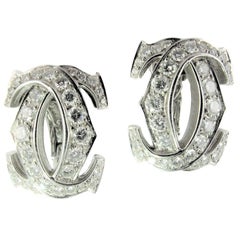 Cartier Pair of Diamond Penelope Double C Earrings.