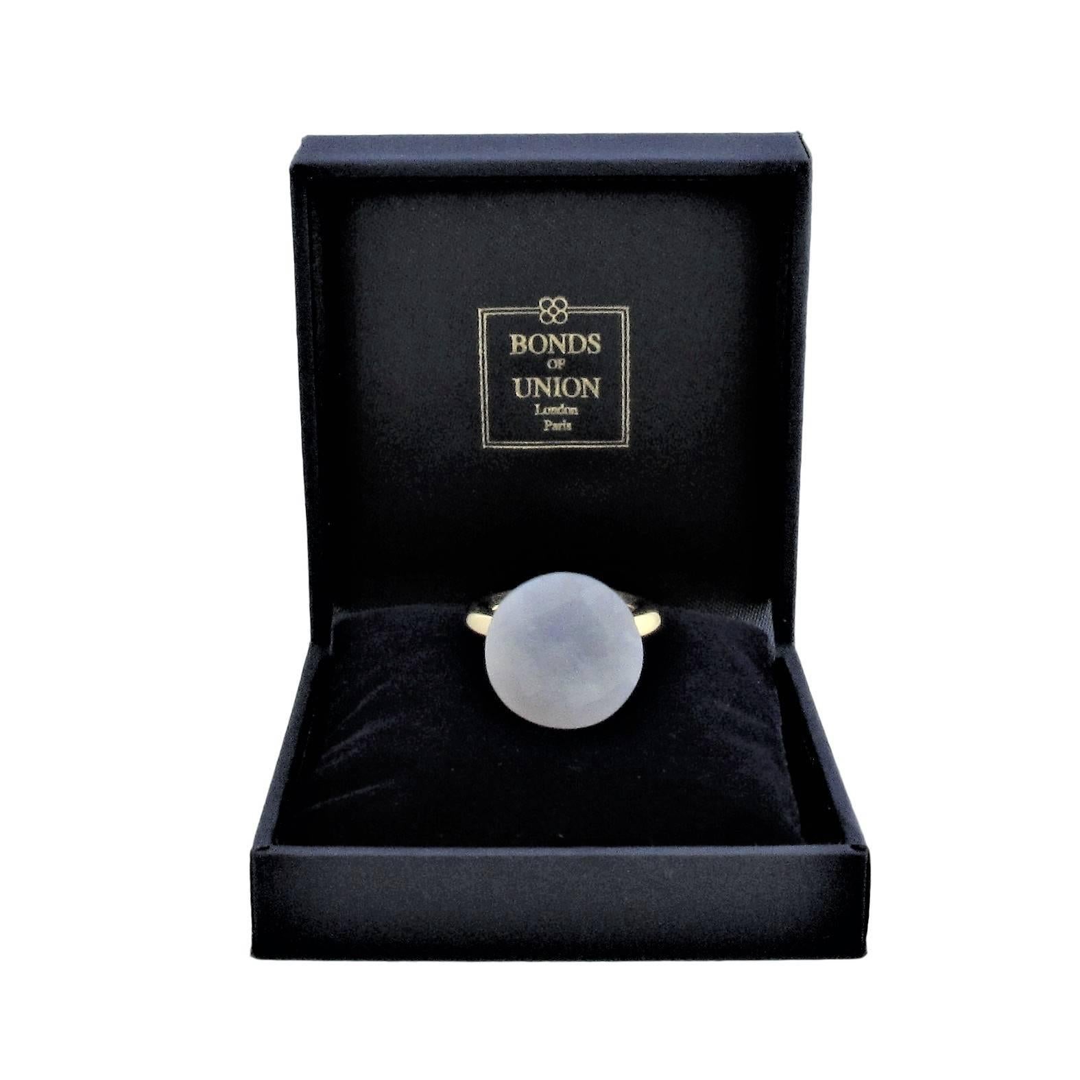 Series Les Voyages:  ' To a Dream Planet ! '  Atelier Bonds. Limited Edition of 18.
Round faceted white chalcedony on cup. Circular band.
18ct French yellow gold plated
Signed BELLESSORT
Available in sizes US 5 1/2- 61/2    French 52-54.