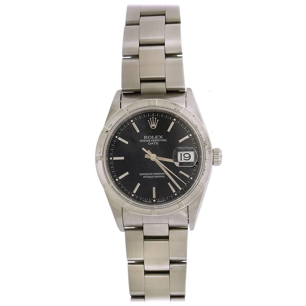 Stainless steel Rolex Oyster Perpetual Date Ref. 15210, made in 1995, is a center seconds, self-winding, water-resistant, stainless steel chronometer wristwatch with date and a stainless steel Rolex Oyster bracelet, with original box and papers. The