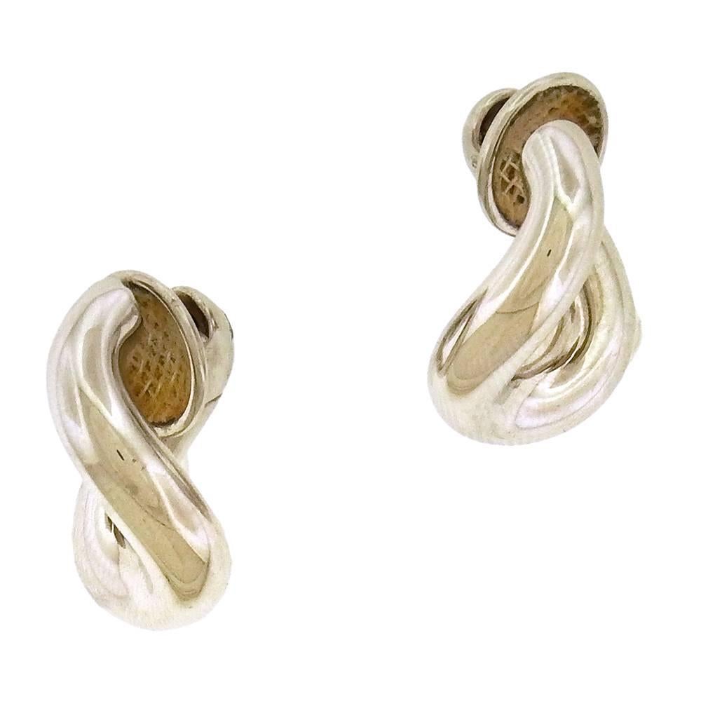 18K white gold twisted curb link earring by Italian jeweler Pomellato for non-pierced ears measures 5/8