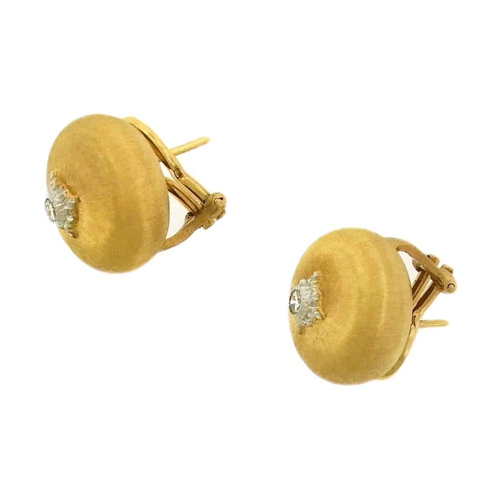 18K gold and diamond button earrings by Buccellati with their signature chased textured finish. The earrings measure 5/8